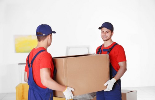 Professional movers handling a flat relocation in Hayes