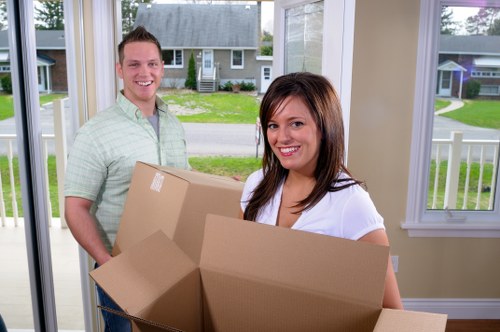 Professional packing team organising household boxes in Hayes