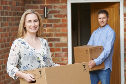Packed household boxes and furniture ready for transport