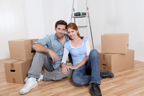 Careful wrapping of fragile items during a Hayes home move