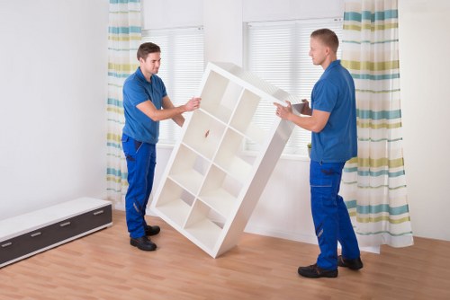 Packing and preparing items for man with van removal in Hayes